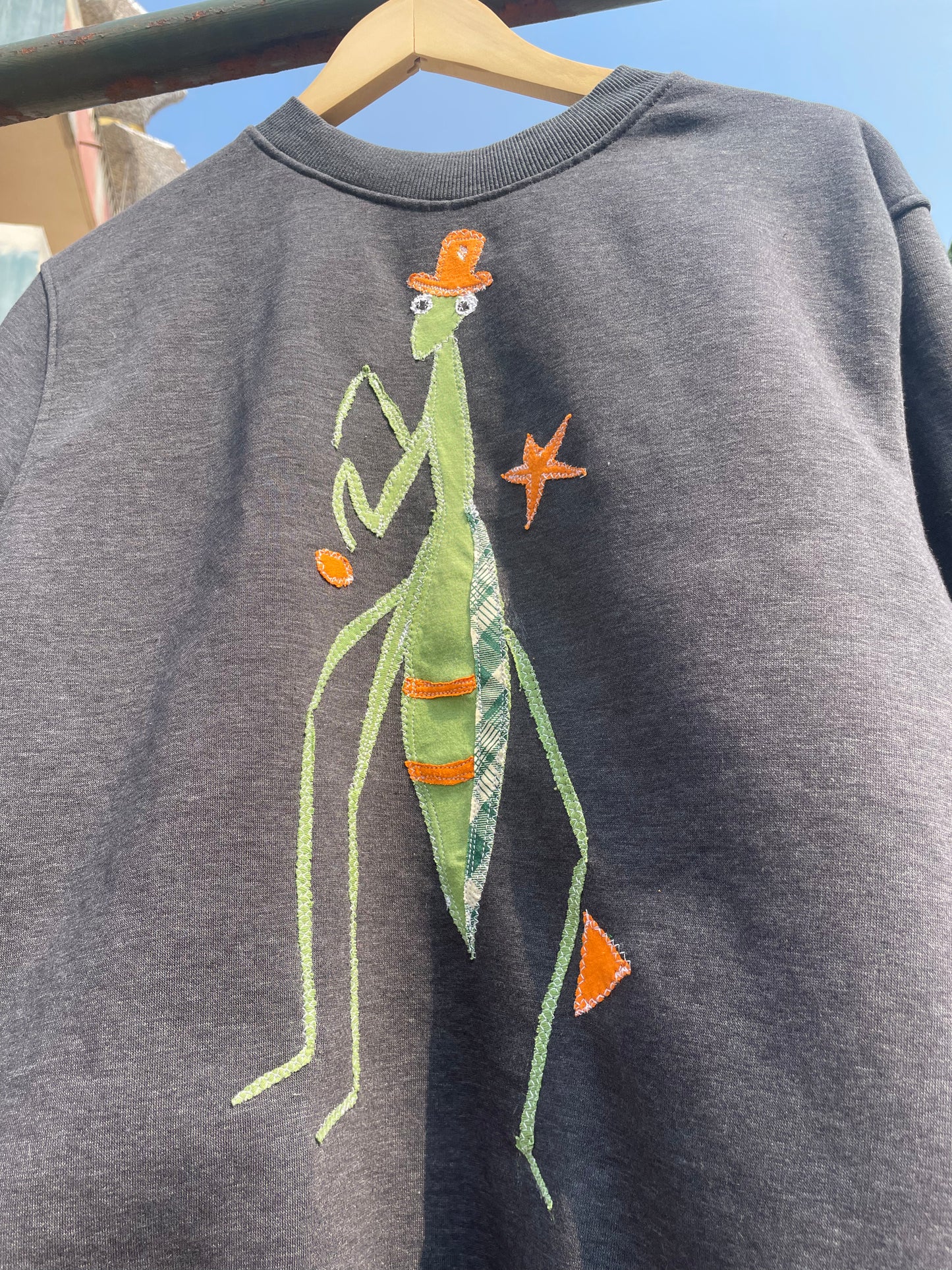PULL MANTE RELIGEUSE (M)